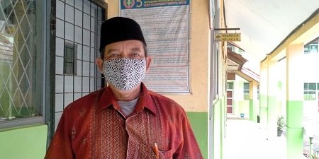Deden Rukmana Pengurus PGRI Cabang Kecamatan Ciseeng Kabupaten Bogor.