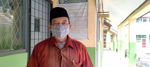 Deden Rukmana Pengurus PGRI Cabang Kecamatan Ciseeng Kabupaten Bogor.